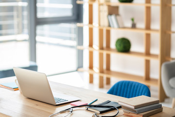 Focused photo on computer that standing on workplace