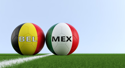 Belgium vs. Mexico Soccer Match - Soccer balls in Belgium and Mexico national colors on a soccer field. Copy space on the right side - 3D Rendering 