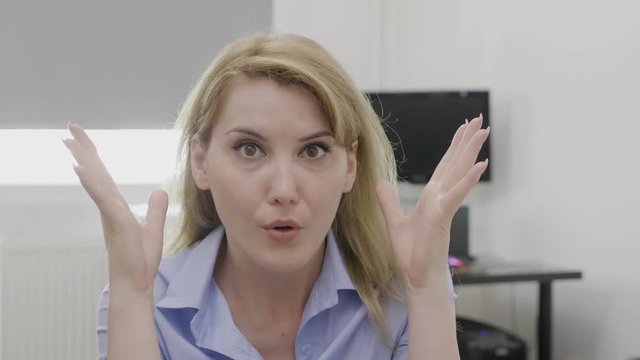Female entrepreneur doing mind blown shocked reaction and gesture