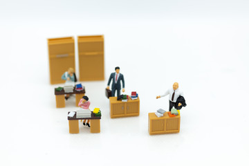 Miniature people : Working in the office, salary man, talent development work. Image use for keeping money for future.