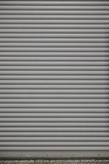 Obraz premium Metal roller shutter door of store closed