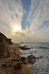 Fishermen during sunset  in national park in Ashqelon