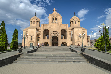 Alley of cypress trees and stairs leading to the main entrance of the Cathedral of St. Gregory Illuminator from Tigran Metz street in the capital of Armenia Yerevan



