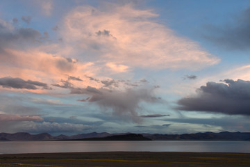 Western Tibet. Sacred lake Dangra (Dang Ra Gyu Tso) in cloudy weather at twilight