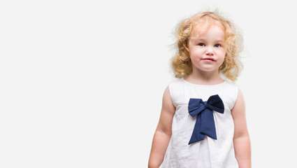 Beautiful blonde toddler gesturing