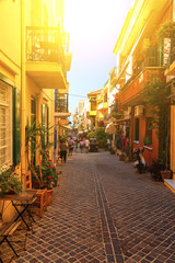 Authentic narrow colorful mediterranean street in Cretan town of Chania, island of Crete, Greece