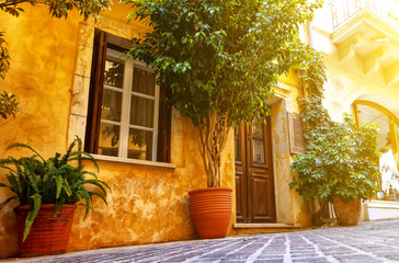 Narrow street in the old town of Chania, with colorful buildings, Crete, Greece
