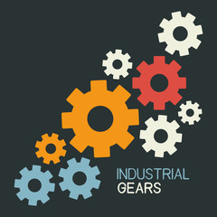 Industrial gears on dark background.