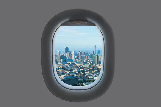 Aerial view of San Francisco Bay and skyscraper from airplane window. California. USA
 