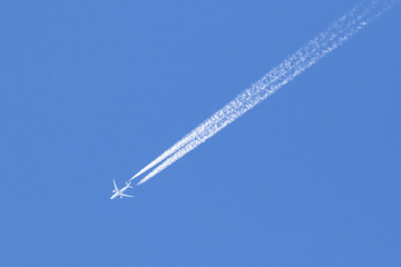 Fototapeta na wymiar Jet flying through the cold sky