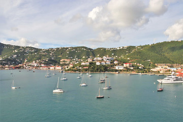 Fototapeta premium Sailboats on the ocean with mountains in the background on the island of St. Thomas
