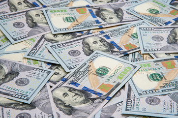 Fototapeta na wymiar Background of 100 dollar bills