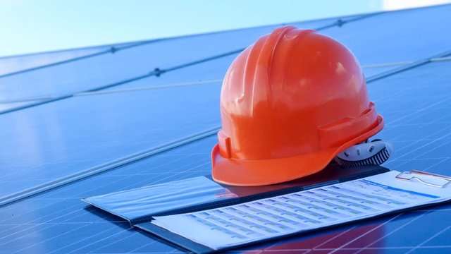 Construction helmet and report on solar cell panel farm or electricity power station