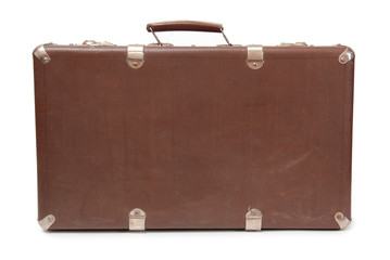 Ancient suitcase for travel on a white background