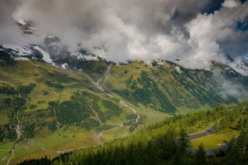 Fototapeta premium Landscape of the Alps. Snow-capped mountain peaks. beautiful meadows of Austria. Freedom, tourism, travel. Großglockner alpine road. 