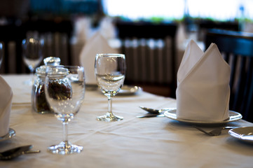 Empty wine glass on the table in restaurant