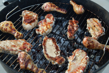 BBQ. Delicious Grilled Pork and Chicken Meat over the Coals on a Barbecue. Picnic Party.

