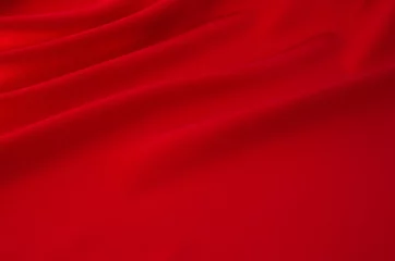 Poster Stof red satin or silk fabric as background
