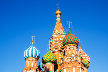 Fototapeta na wymiar Top of St. Basil's Cathedral, Moscow, Russia with blue sky background.