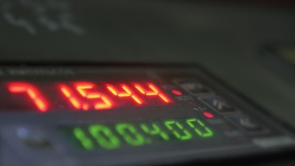 Electronic digital dial meter counter pipe. Manufacture of plastic water pipes of the factory. Process of making plastic tubes on the machine tool with the use of water and air pressure.