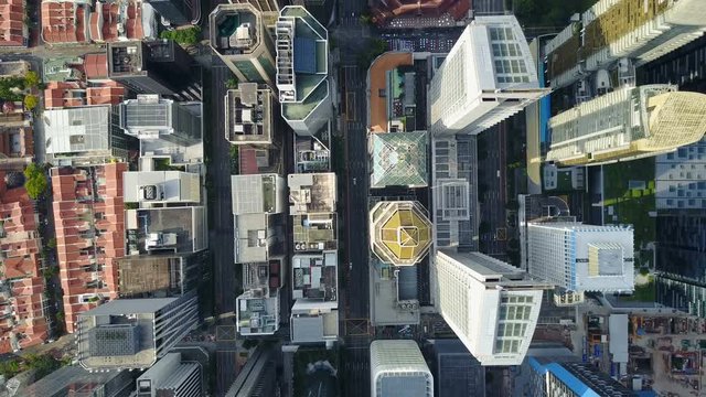 Static overhead drone shot of commercial office buildings in central business district Singapore