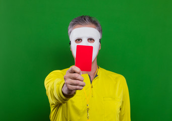 football referee showing a red card