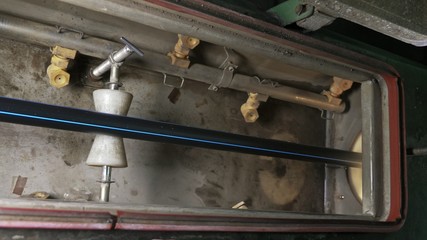 Pipes manufacturing production line. Manufacture of plastic water pipes of the factory. Process of making plastic tubes on the machine tool with the use of water and air pressure.