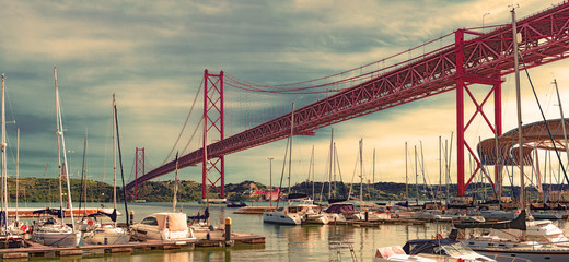 Bridge of April 25 in Lisbon.Cityscape of Lisbon and seaport. Entertainment and leisure in...