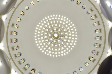 Ceiling with a chandelier at the hall for praying (iwan) of the Ar-Rahma Mosque (Mercy Mosque). March 21, 2018. Kiev, Ukraine