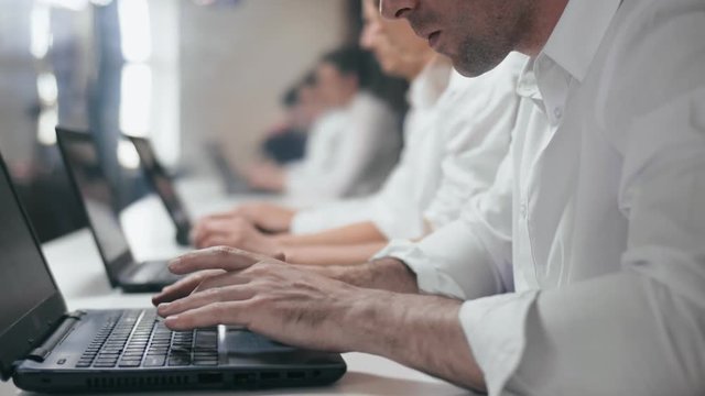 Manager nervously breaking the keyboard