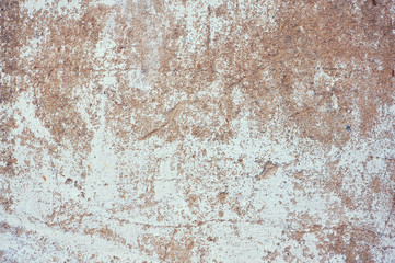 Old shabby beige shabby concrete background. Abstract background.