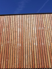 Larch wooden planks facade texture background