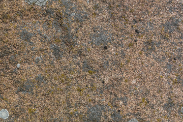 Natural granite stone texture, red with white and gray lichen.