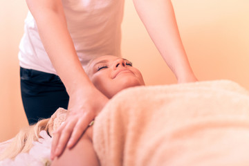 Obraz na płótnie Canvas Woman enjoying a relaxing massage