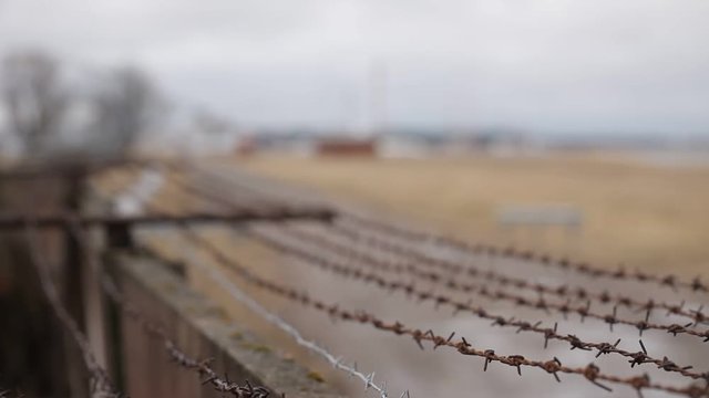 Barbed wire on the fence near airport
