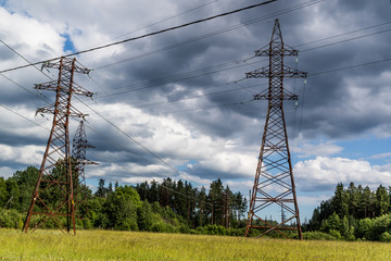 Power line towers and wires. Sunny day.