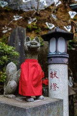 Statue with red bib