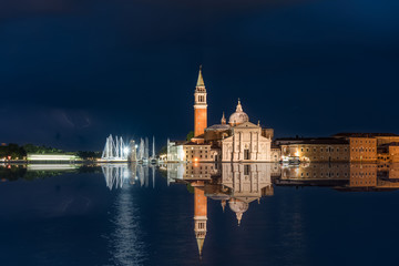 Obraz premium San Giorgio Maggiore church at night with reflection in Venice, Italy