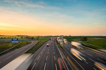 M11 motorway in England at sunset