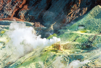 The steam from geysers Owakudani, national park Hakone, Japan. Copy space for text.