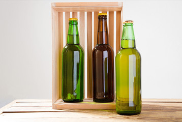 Beer bottles on a wooden table . Top view. Selective focus. Mock up. Copy space.Template. Blank.