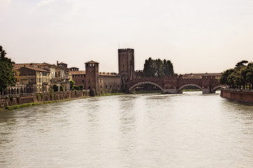 Fototapeta na wymiar Riverside in Verona, Italy. Summer Day time