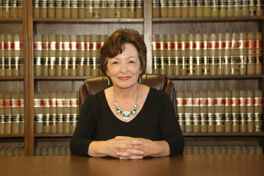 Portrait of a woman, woman lawyer in law office.