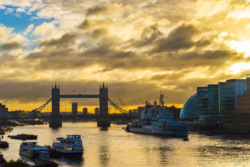 Panorama of London withTower Bridge at colorful sunrise sky in London, England