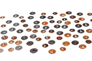 Old rusty metal thumbtacks, isolated on white background