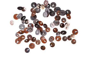 Old rusty metal thumbtacks, isolated on white background