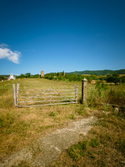 Fototapeta na wymiar Old wooden farm gate in Romania, Europe