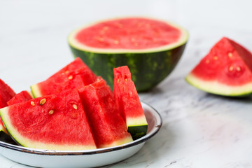 Sliced Watermelon on White Countertop
