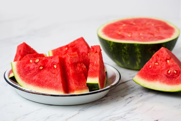 Sliced Watermelon on White Countertop
