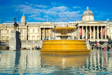 Water fountain at Trafalgar square near National museum in London,England